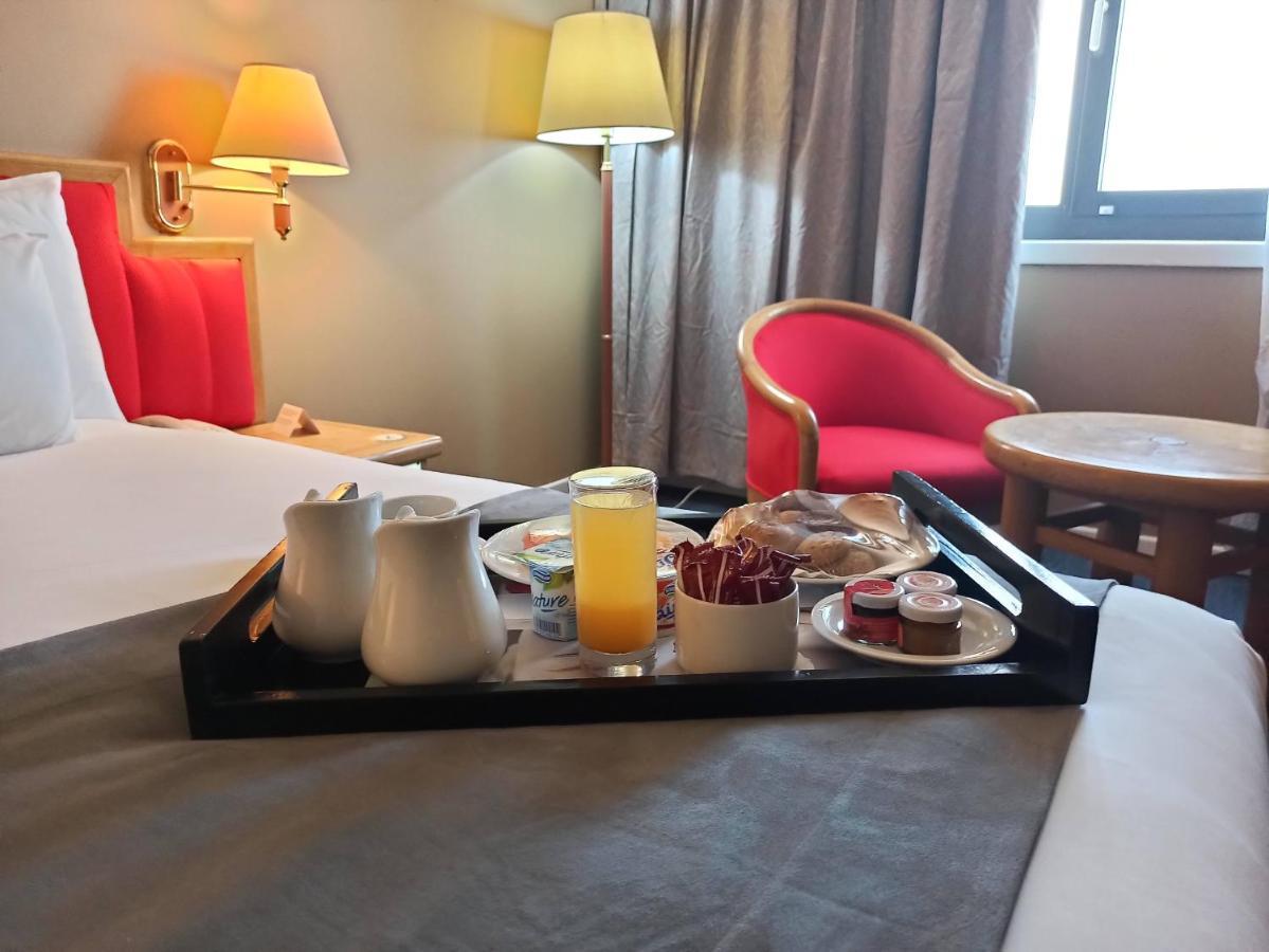 Hotel Mercure Alger Aeroport Dar el Beïda Dış mekan fotoğraf Room service tray