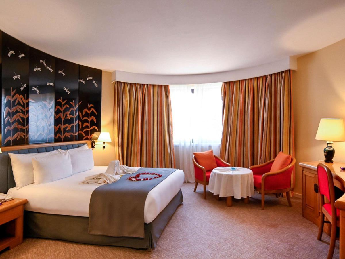 Hotel Mercure Alger Aeroport Dar el Beïda Dış mekan fotoğraf A room at the hotel