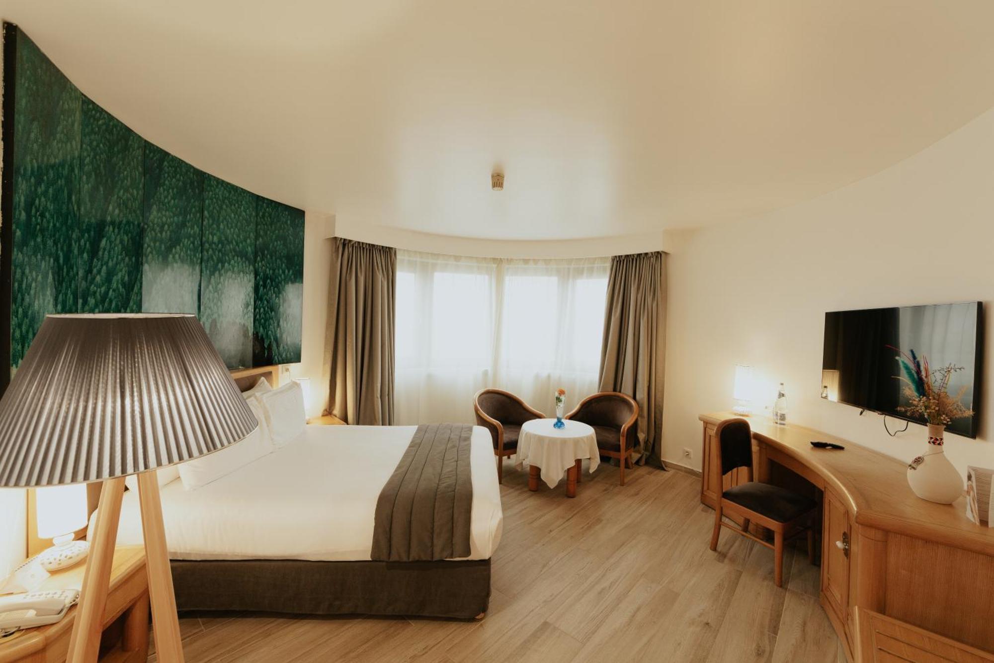 Hotel Mercure Alger Aeroport Dar el Beïda Dış mekan fotoğraf A room at the hotel